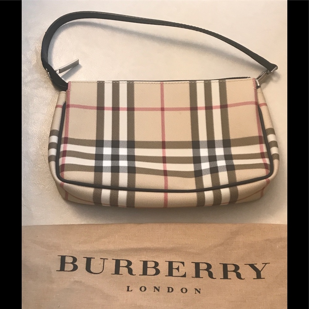 Burberry handbag with sewn in tag.
